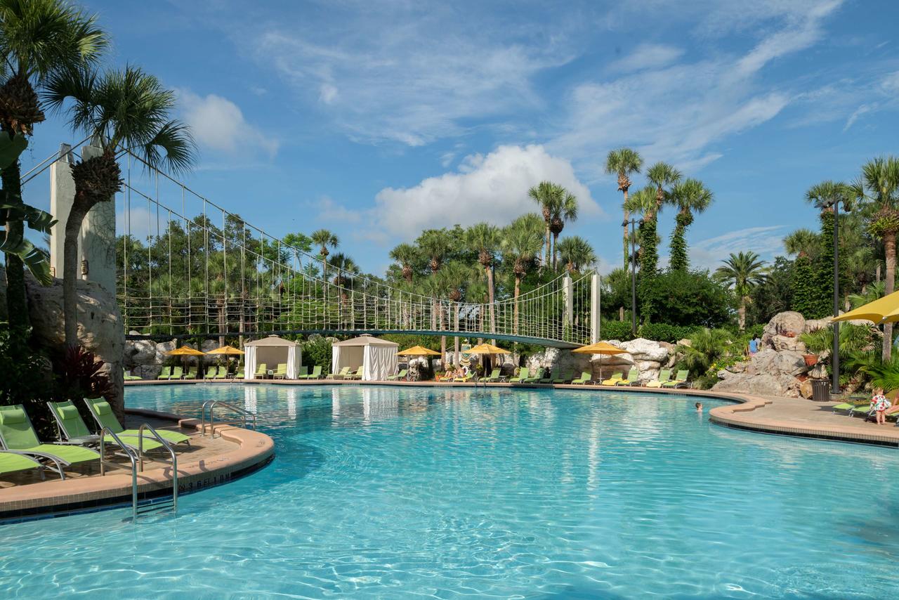 best hotels near disney Hyatt regency resort lagoon style pool with drawbridge 