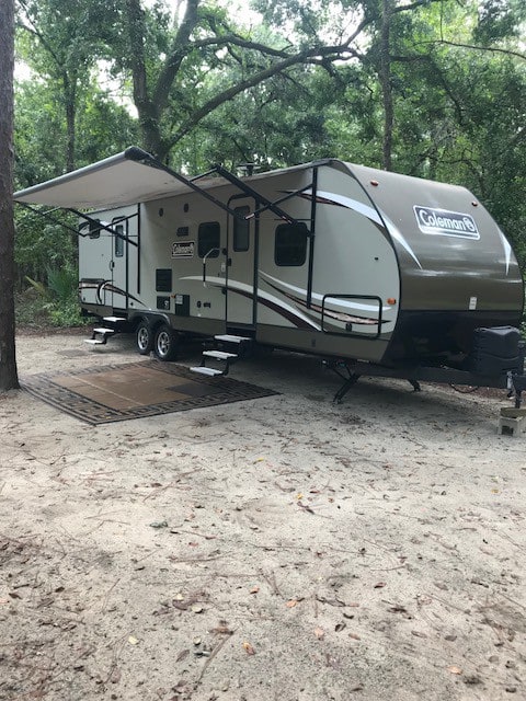 outside view of the camper for the golf cart package vacation rental near Disney
