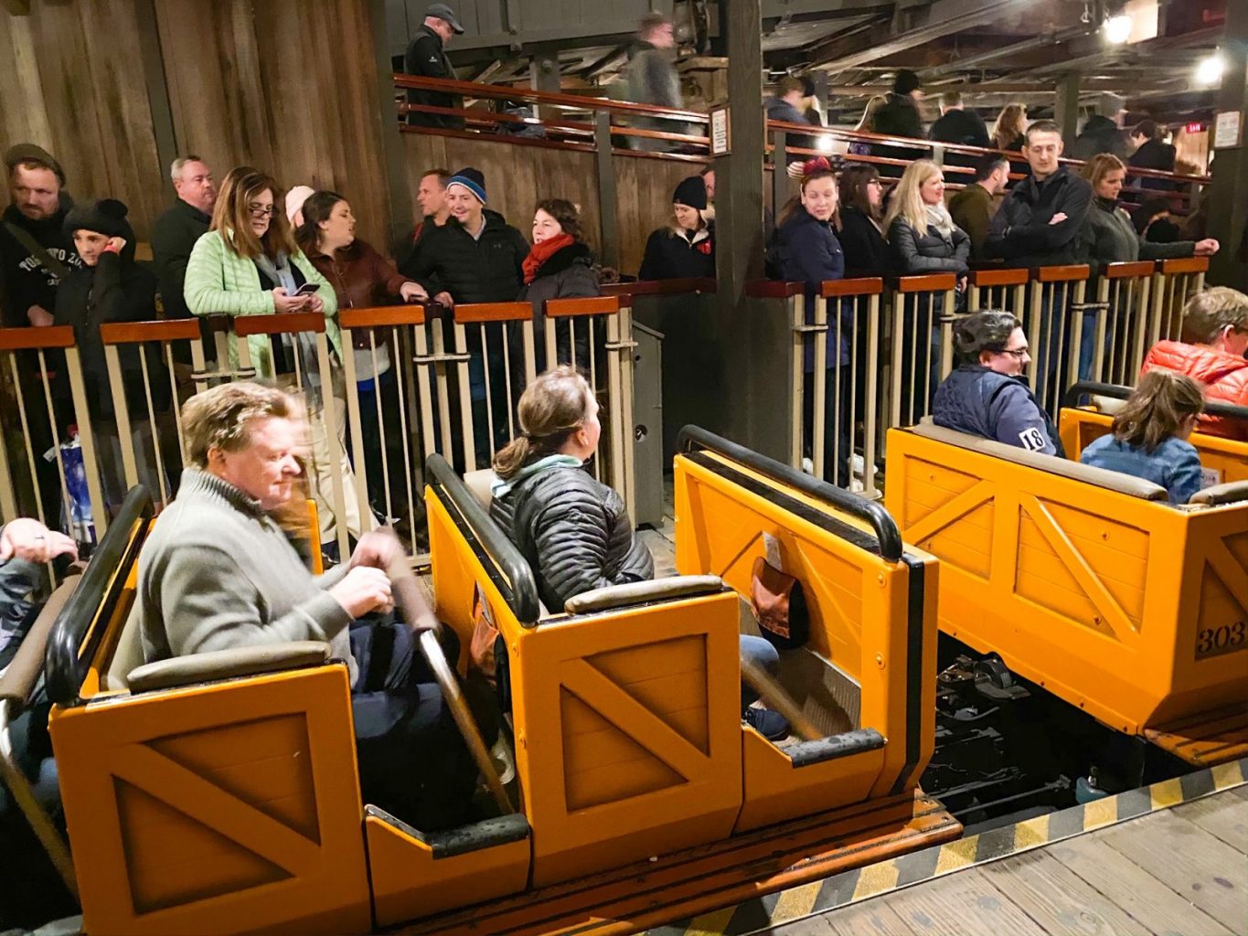 guests sitting in the Big Thunder Mountain Railroad train