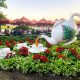 teapot in garden at epcot for the holidays
