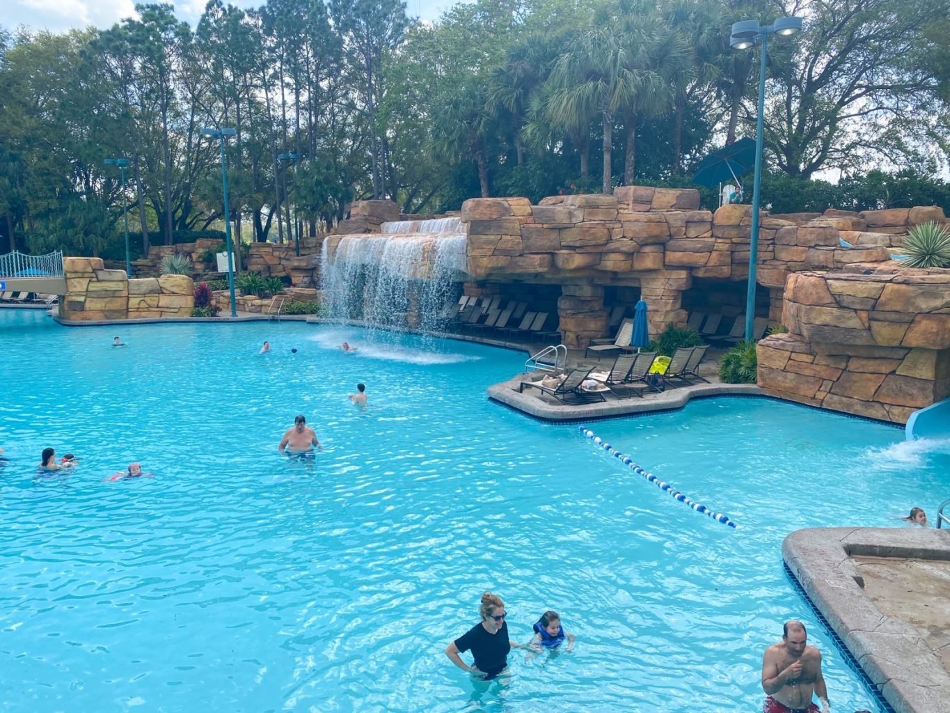 best hotels at Disney World pool at swan and dolphin resort with waterfall in center
