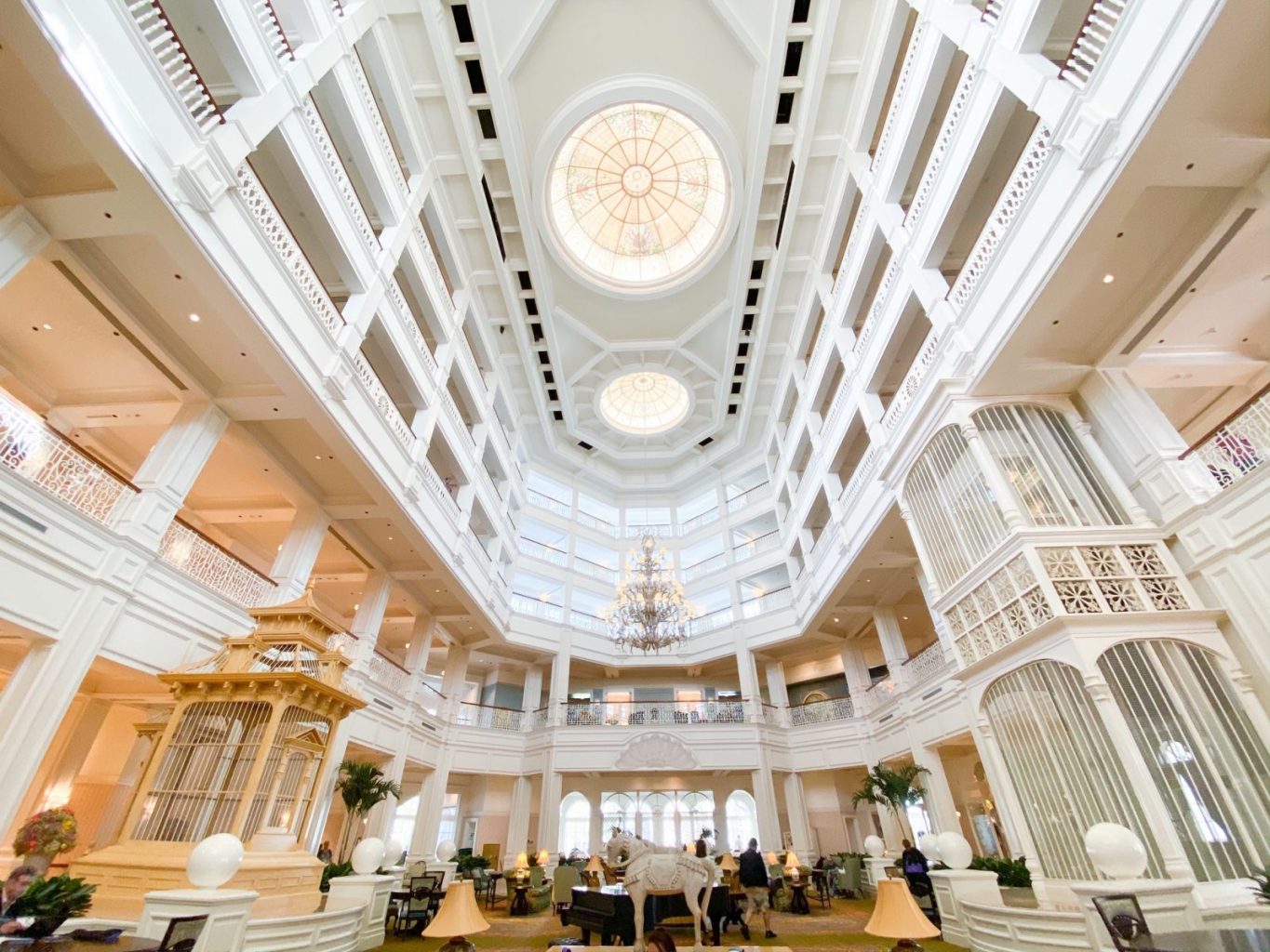 disney arrival day lobby at grand Floridian hotel with skylight and large columns