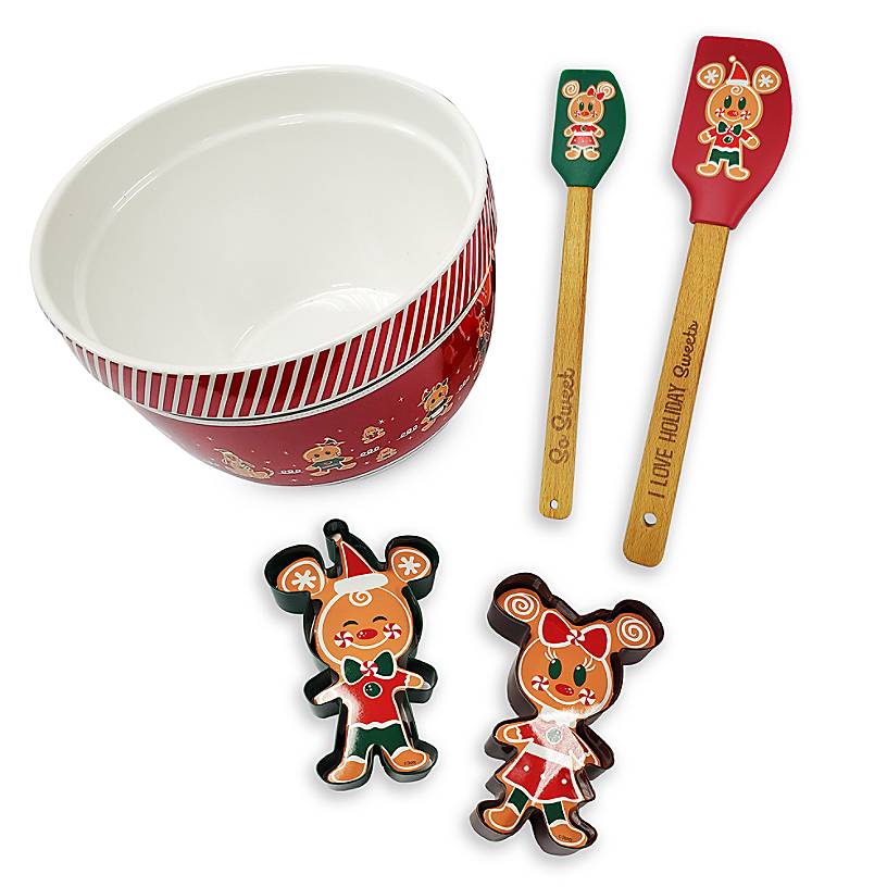 Mickey gingerbread baking set that includes a mixing bowl, two spatulas, and two Mickey and Minnie shaped gingerbread cookie cutters