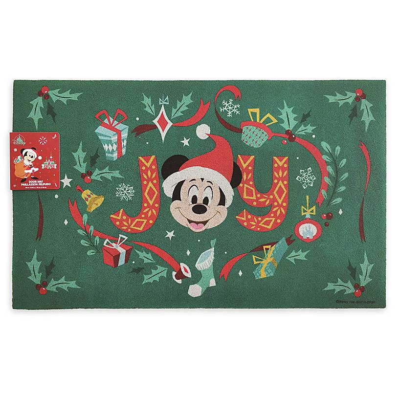 a green door mat that says "JOY" with Mickey Mouse on it