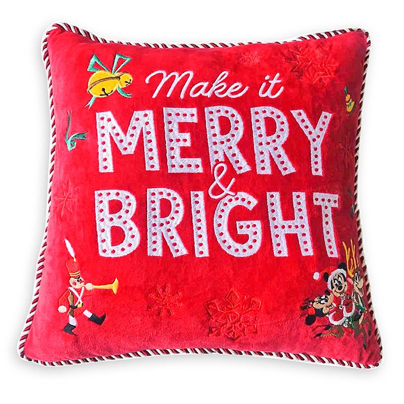 red throw pillow that says "Make it Merry and Bright" with Mickey and Minnie Mouse