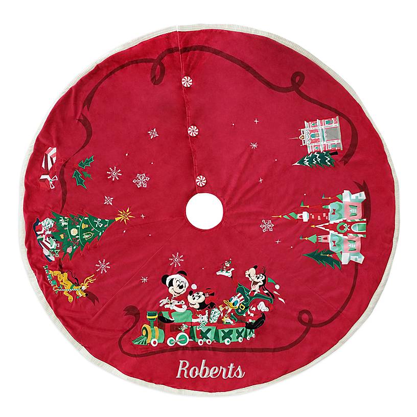 red tree skirt with Mickey Mouse and his friends on it
