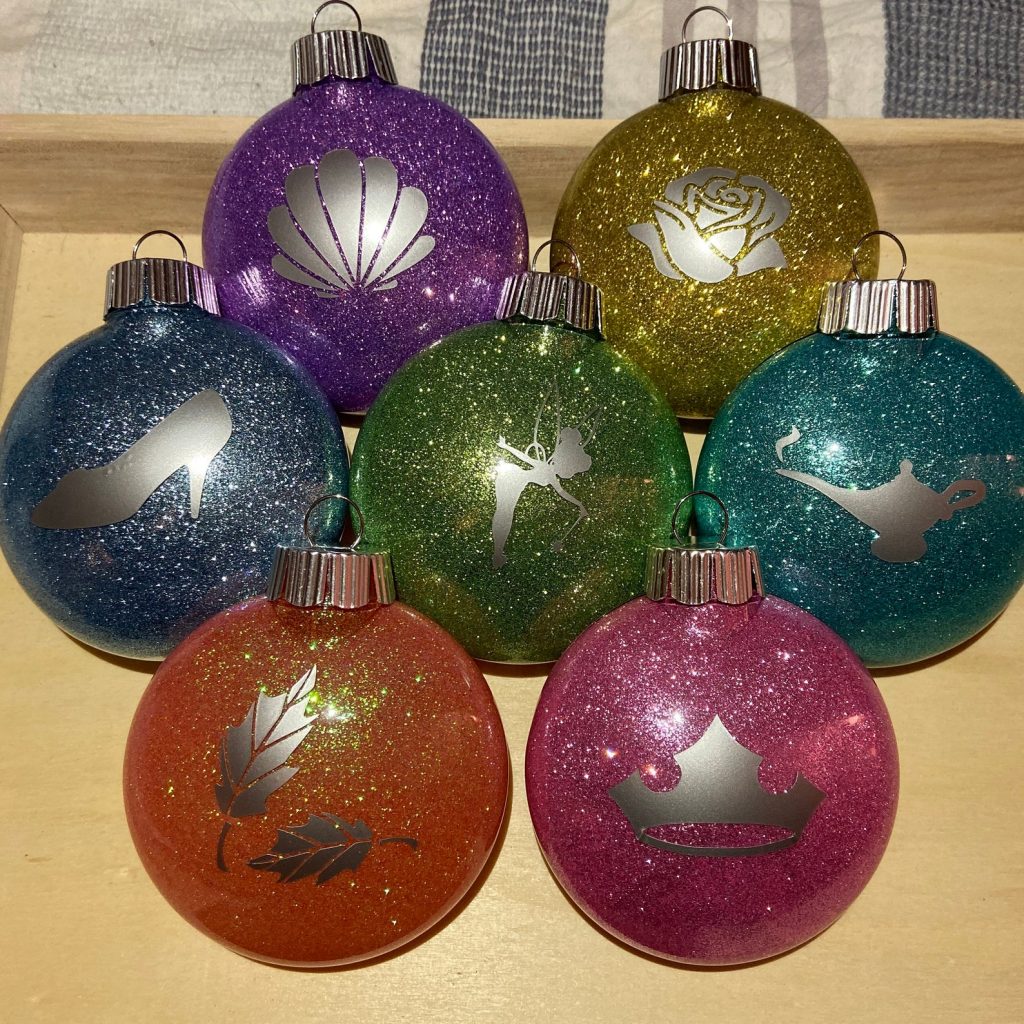 Disney ornaments glitter color with character symbol on front