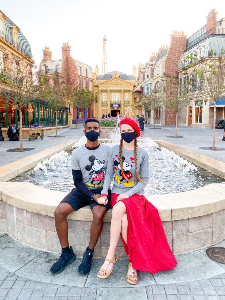 couple in front of france pavilion