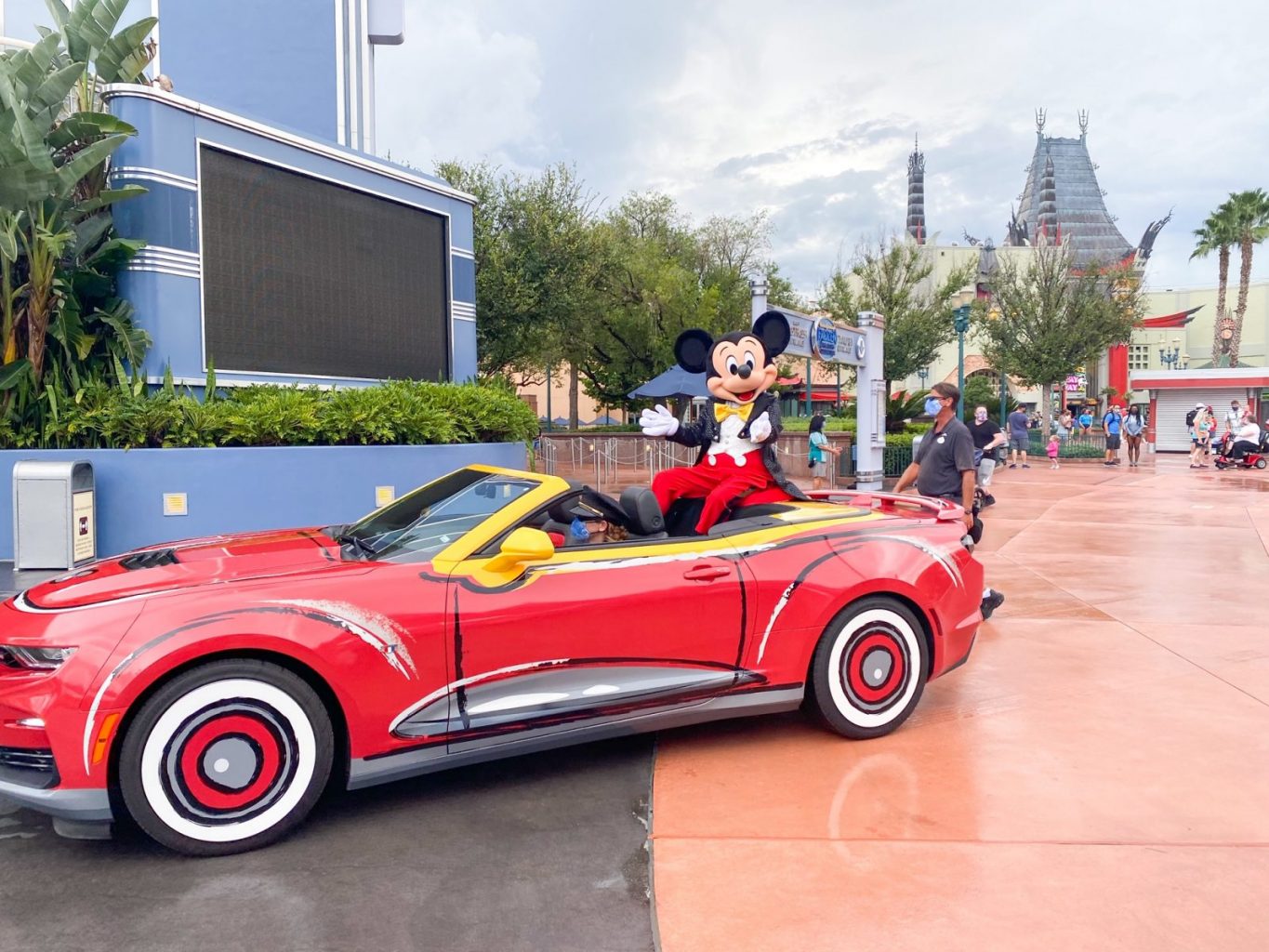 Mickey Mouse riding a car at Hollywood Studios