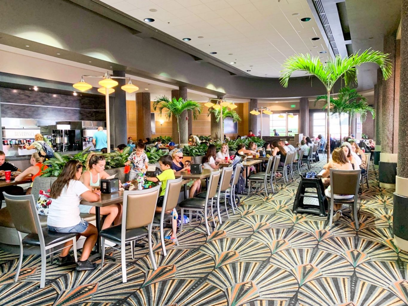 inside of abc commissary in Hollywood studios print carpet and palm tree decorations