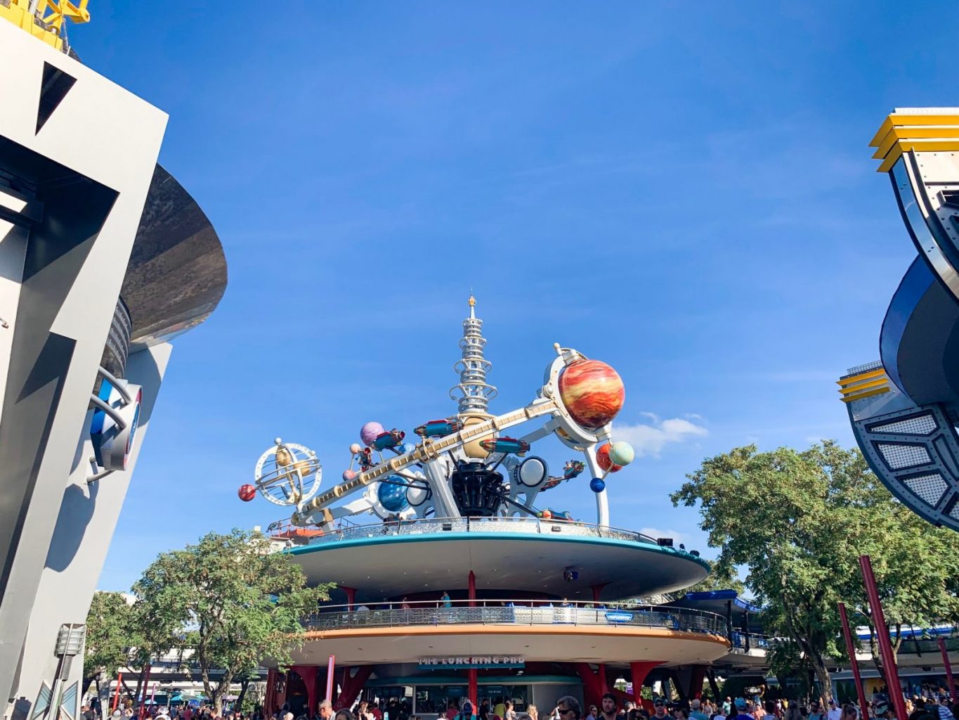 view of the Astro Orbiter from the entrance of Tomorrowland