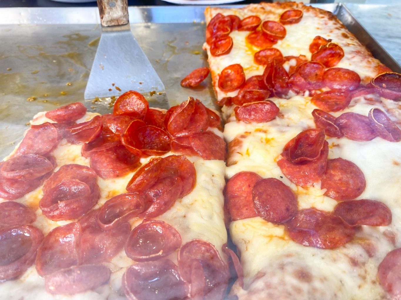 Best pizza at Disney pepperoni slice from Italian Pavilion