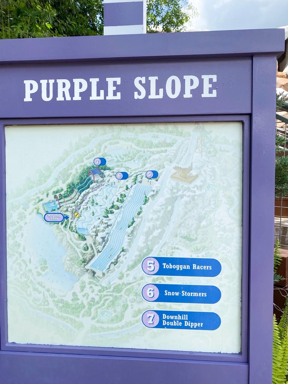 purple sign at water park