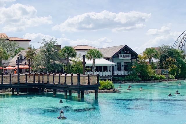 exterior of dluxe burger, water, and pier at disney springs