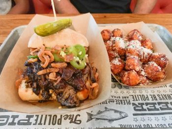 loaded bbq sandwich and tater tots at polite pig
