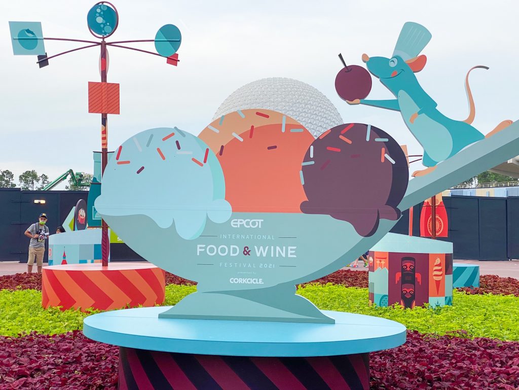 Epcot food and wine sign with Remy