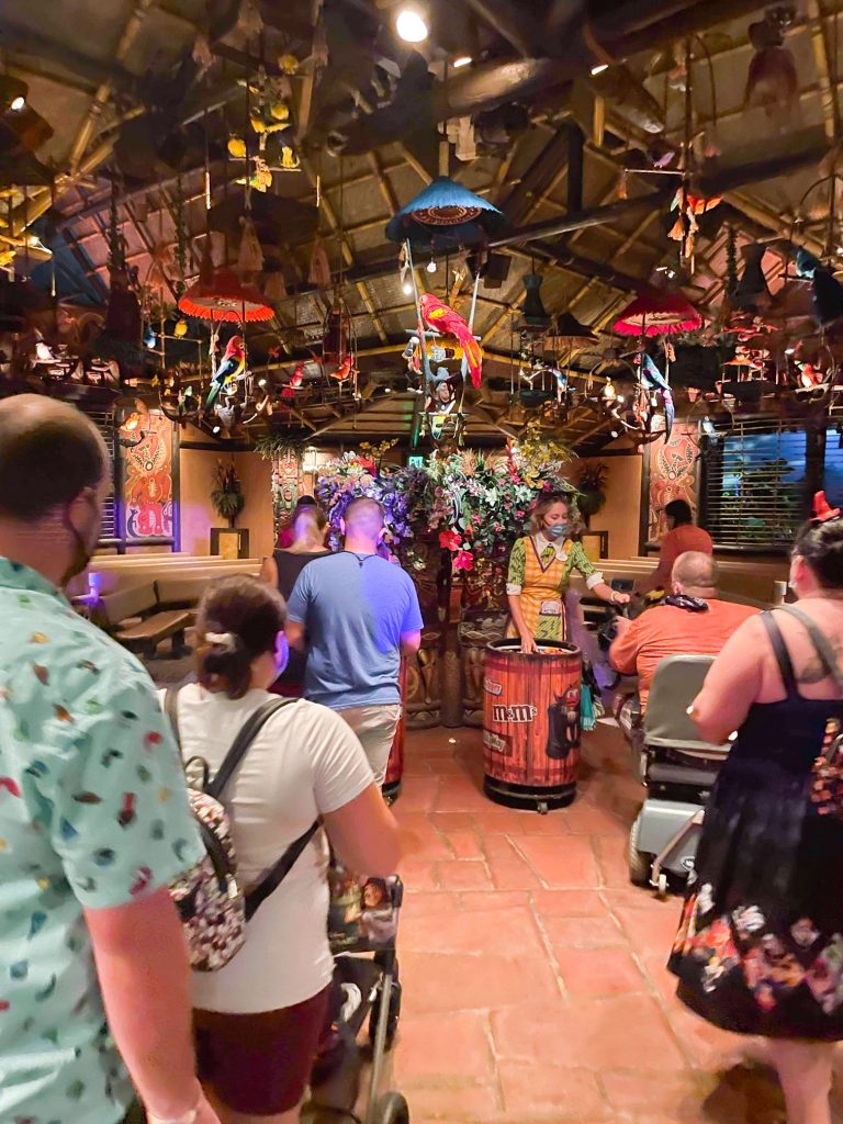 cast members handing out candy at the Tiki Room treat location