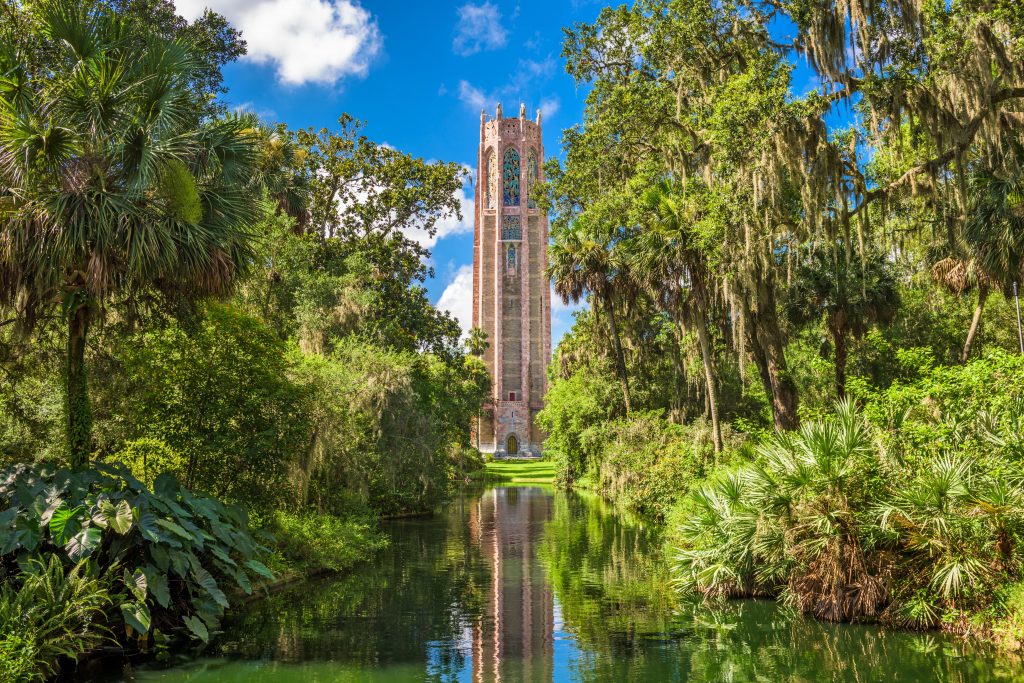trees, lush gardens, and carillon tower disney rest day