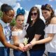 women holding hands with tinkerbell using disney memory maker