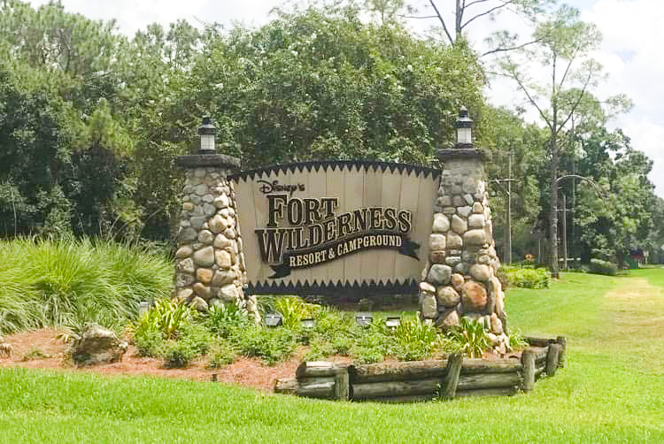 sign made of wood and stones for Fort Wilderness resort and campground 