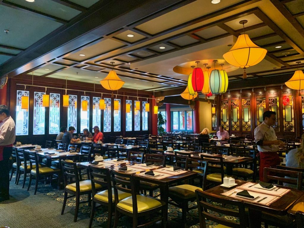 A formal dining room sporting Chinese decor