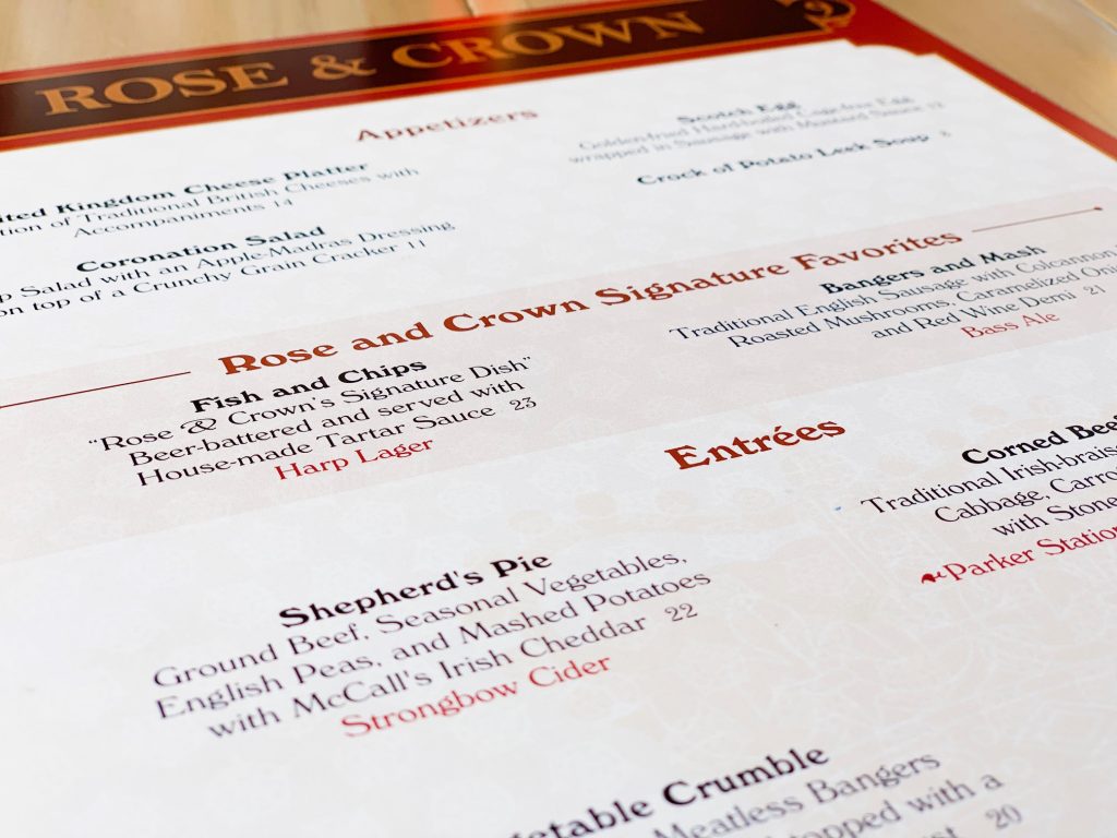 A close up of a Rose and Crown menu