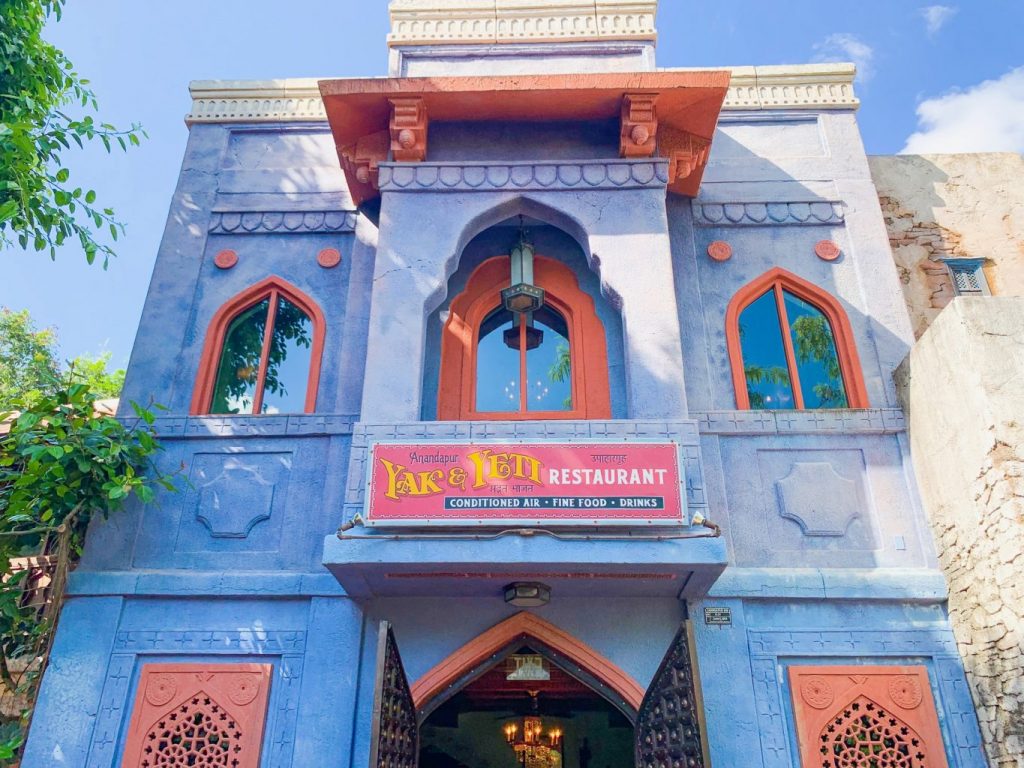 A blue and orange building with a Yak and Yeti sign