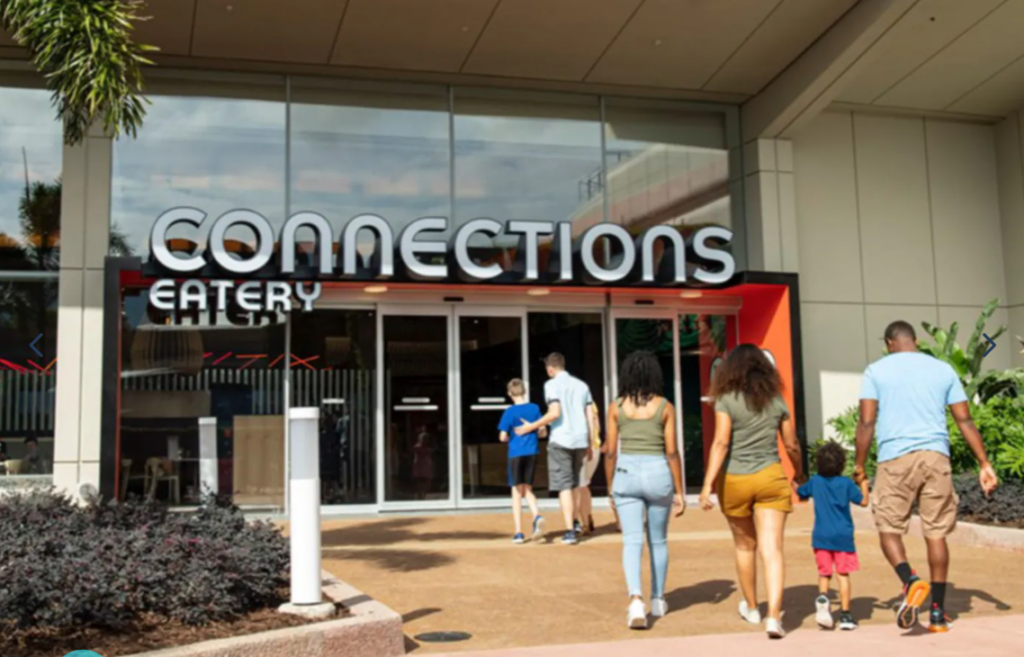 People walking to Connections Eatery, a new restaurant with gluten-free items at Disney