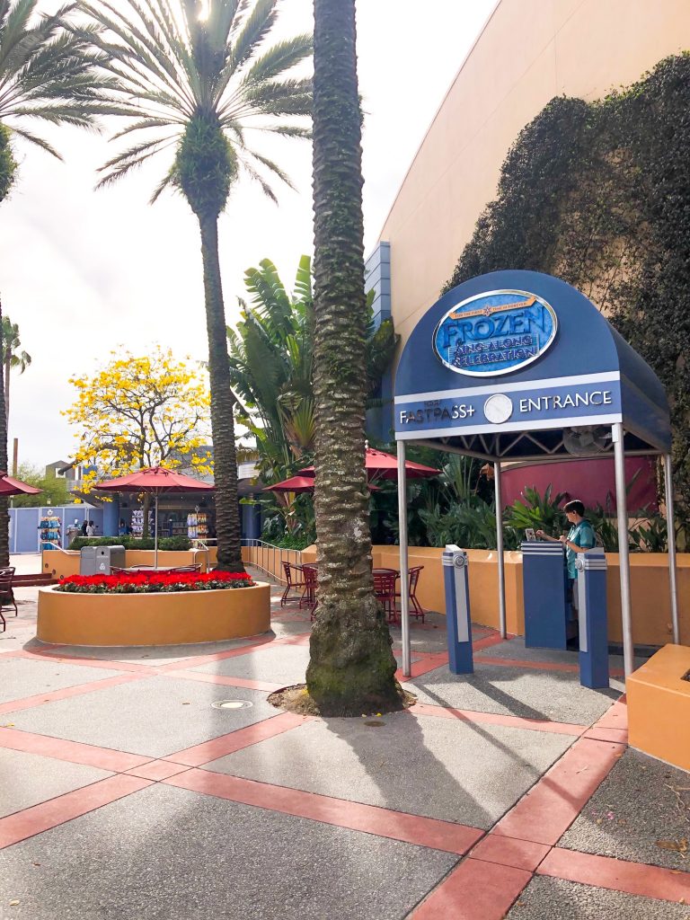 trees and entrance awning to frozen show best things to do in Hollywood Studios