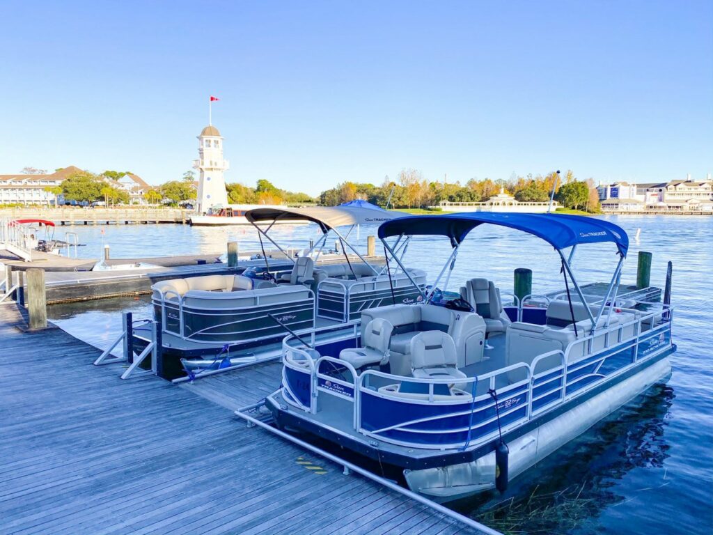 blue and white boats on water hidden gems at Disney