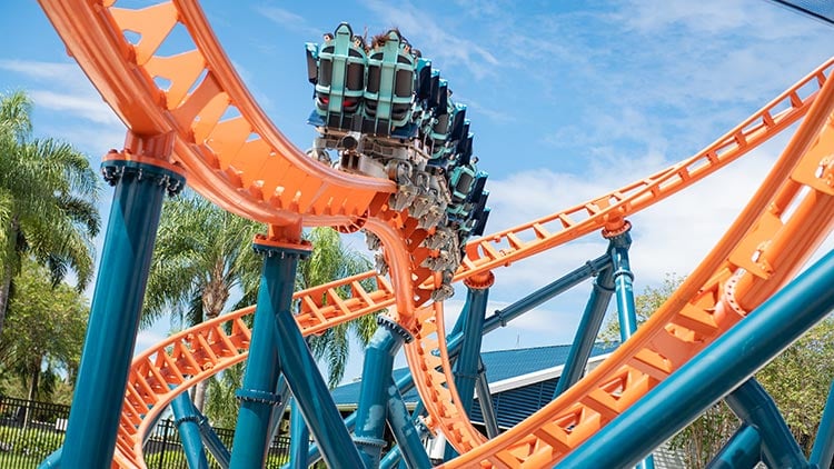 The bright orange track of Icebreaker at Seaworld Orlando and sharp backward launches makes this ride stand out as one of the best rides in Orlando theme parks.