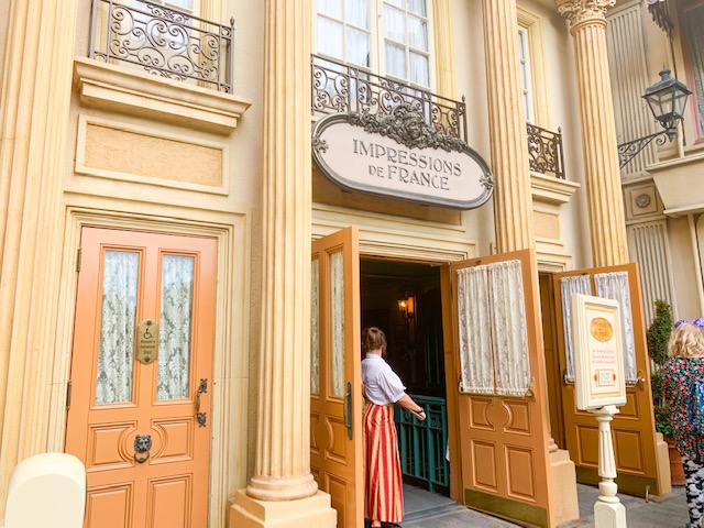 exterior of French style building with doors open for film Epcot for adults