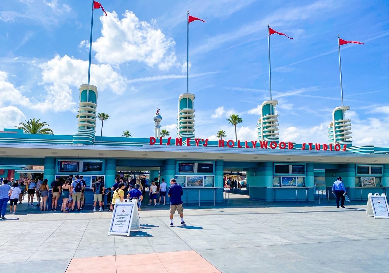 retro green park entrance with flags Hollywood studios for adults