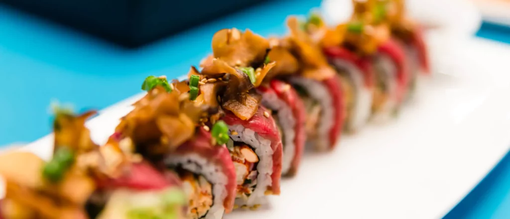 A zoomed in photo of Sushi features a clear shot of the fresh made meal from one of the best restaurants at Universal Orlando: Cowfish! 