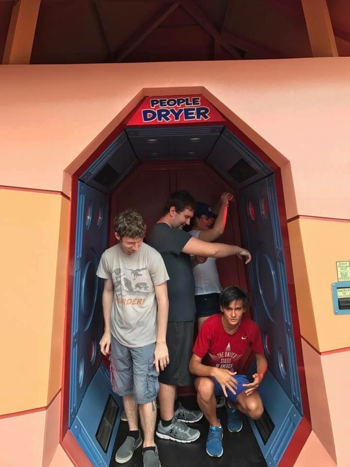 A group of people rotate in the people dryer after not knowing which mistakes to avoid at Universal Orlando: they got soaked on the water rides.