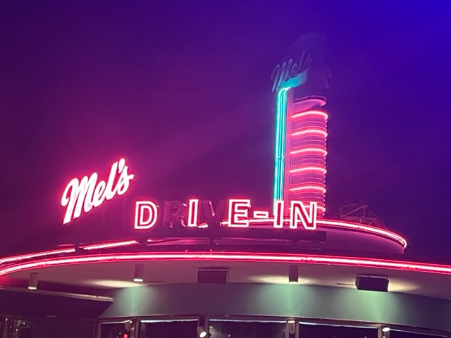 At Halloween Horror Nights, the glitch in the lights at Mel's Drive In Spell out Mel's Die In. 