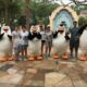 people standing at universal orlando with characters dressed up